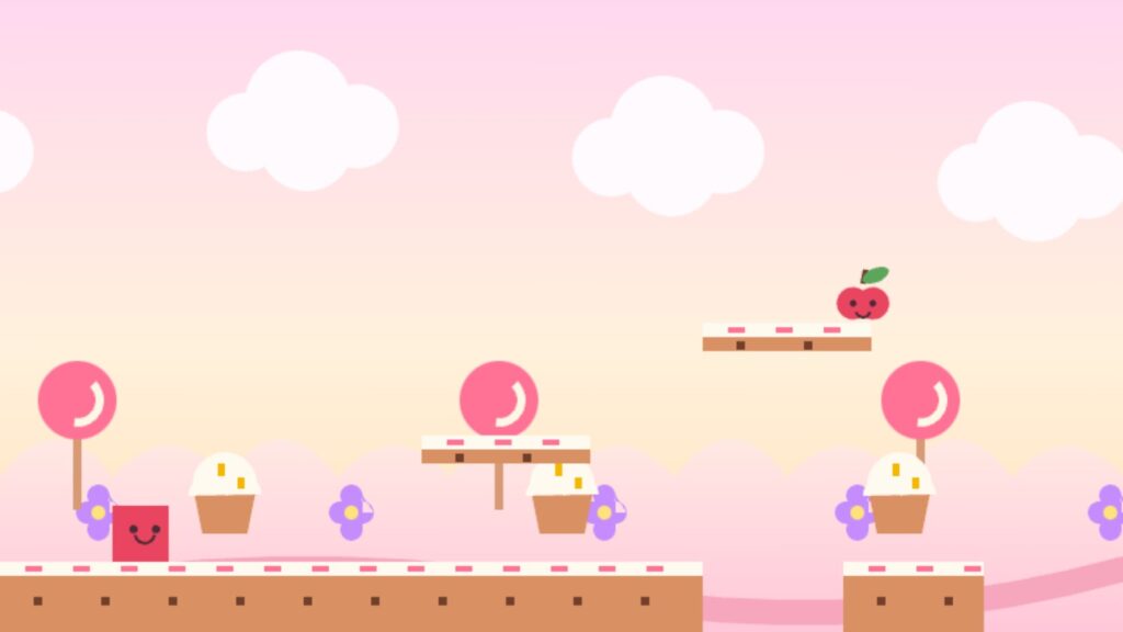 ピンクの空に綿あめ雲、ペロペロキャンディーとカップケーキが並ぶスイーツランドのゲーム画面